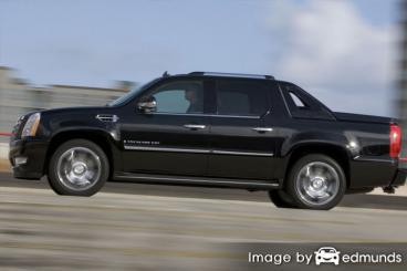 Insurance rates Cadillac Escalade EXT in Oakland